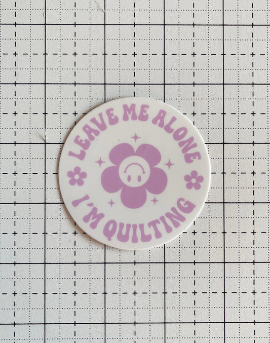 ANTISEWCIAL QUILTERS CLUB | Leave Me Alone, I'm Quilting Sticker Lilac